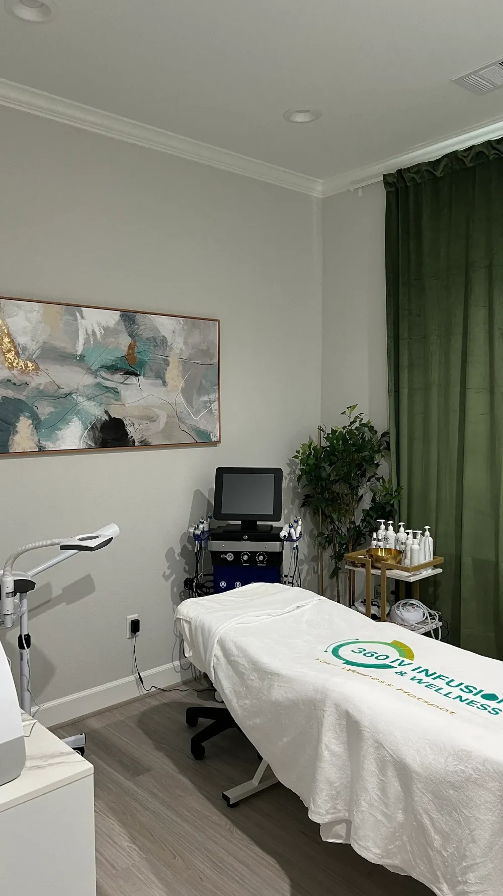 Hydrafacial treatment room with branded blanket at 360 IV Infusion and Wellness