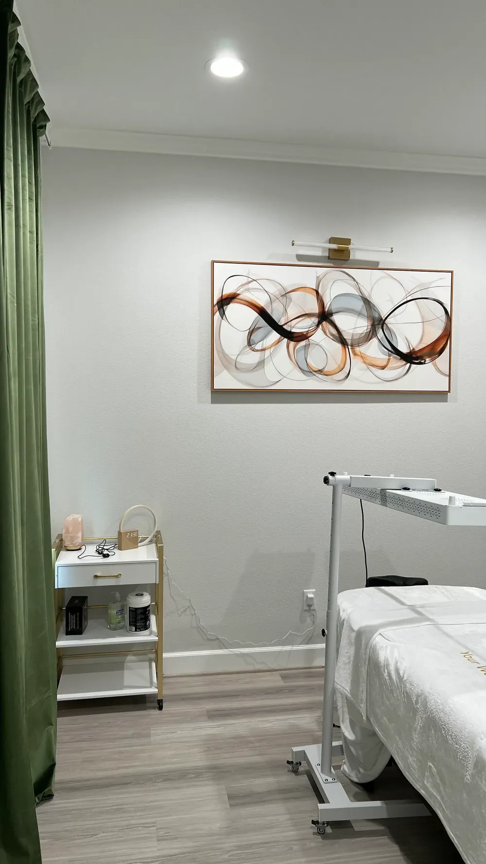 Massage room with red light therapy equipment at 360 IV Infusion and Wellness