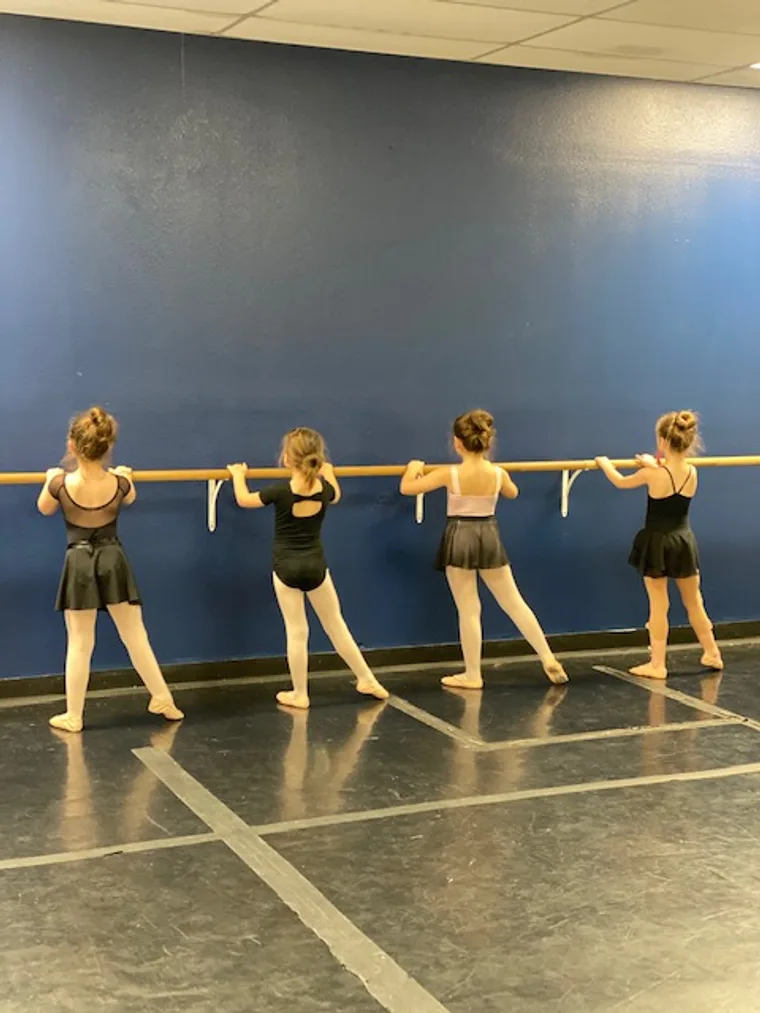 Young dancers at the barre during a class at Integrity Dance Arts in McKinney, TX