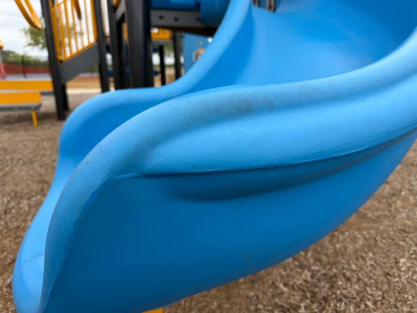 Playground slide before deep cleaning by The Playground Standard